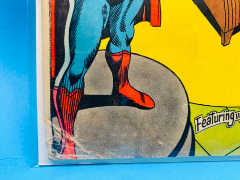 Photo 3 of 985951…vintage $.12 cent Superman comic 211 in plastic sleeve- wear, folds, creases 