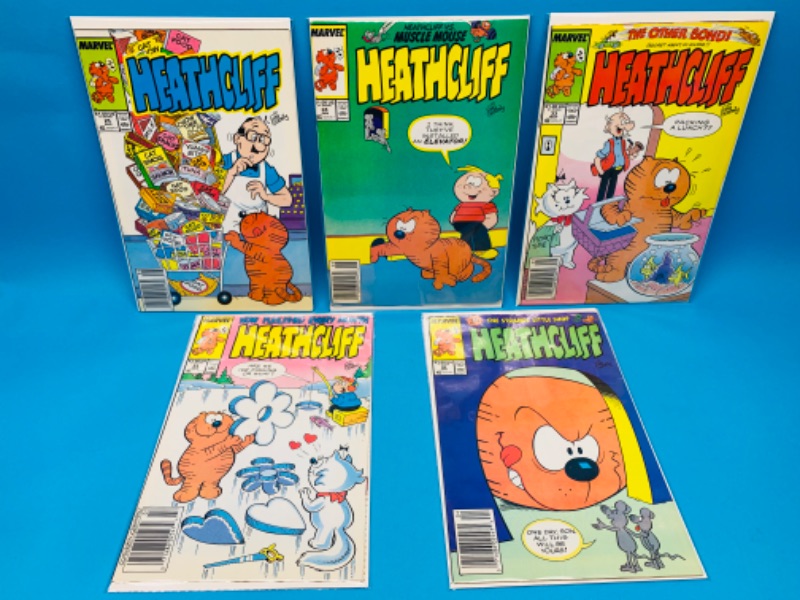 Photo 1 of 985954…5 vintage Heathcliff  comics in plastic sleeves 