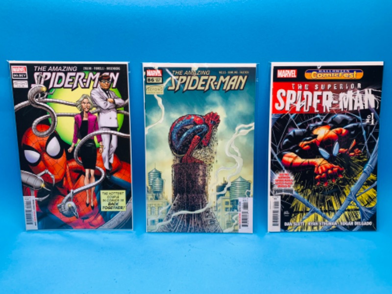 Photo 1 of 985958…3 Spider-Man  comics in plastic sleeves 