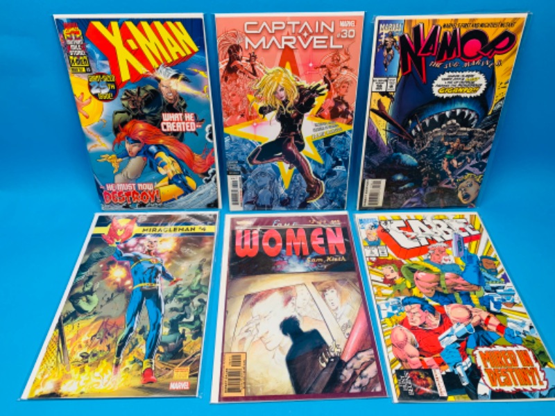 Photo 1 of 985963..  6 comics in plastic sleeves 