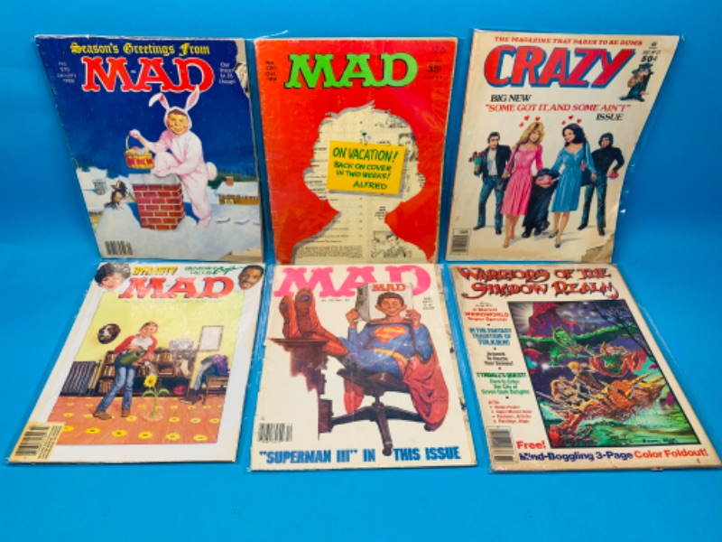 Photo 1 of 985973…condition issues- 6 vintage comic magazines in sleeves- wear, rips, stains