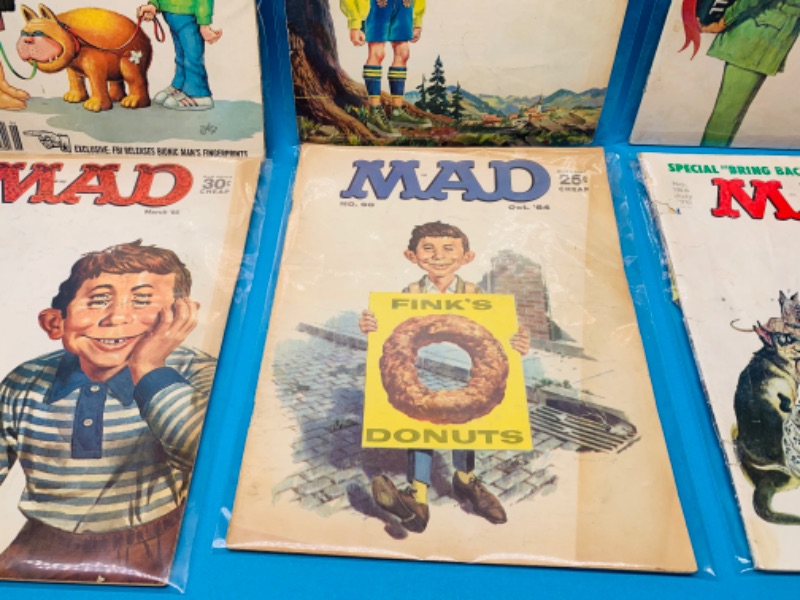 Photo 3 of 985977… condition issues- 6 vintage MAD magazines in sleeves- wear, rips, stains