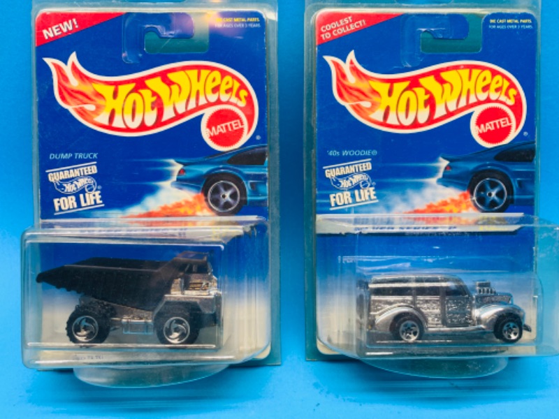 Photo 1 of 986010…  2 hot wheels die cast silver series trucks in cases 