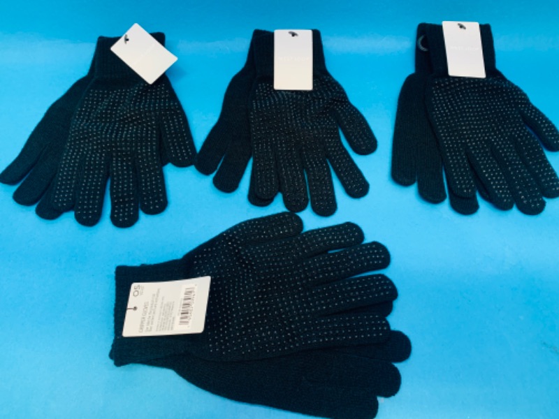 Photo 1 of 986026… 4 pair of Gripper gloves - one size 