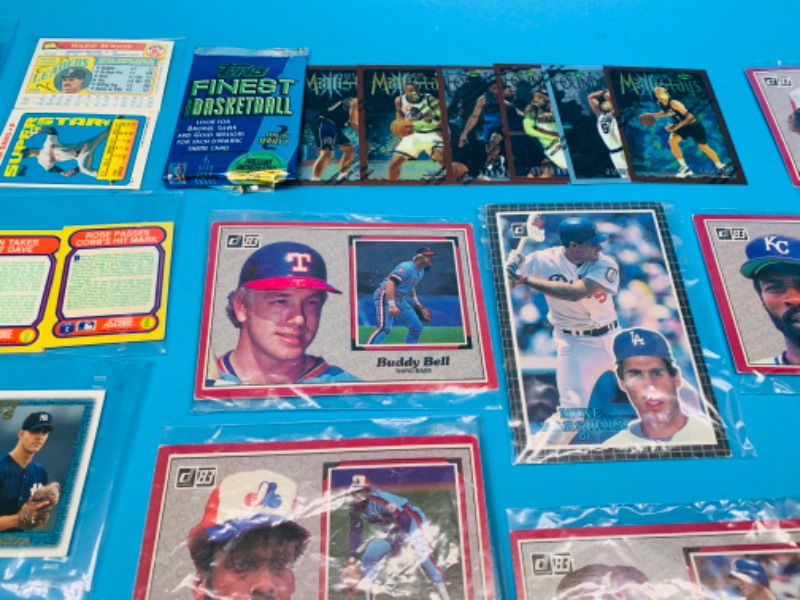 Photo 4 of 986407…specialty sports cards in plastic sleeves 