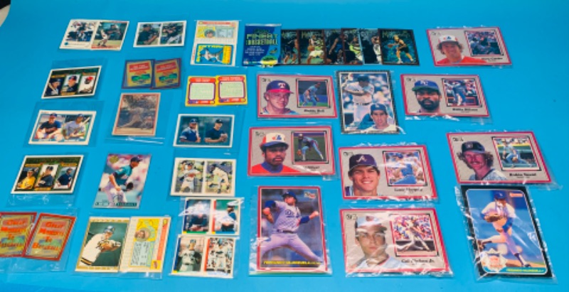 Photo 1 of 986407…specialty sports cards in plastic sleeves 