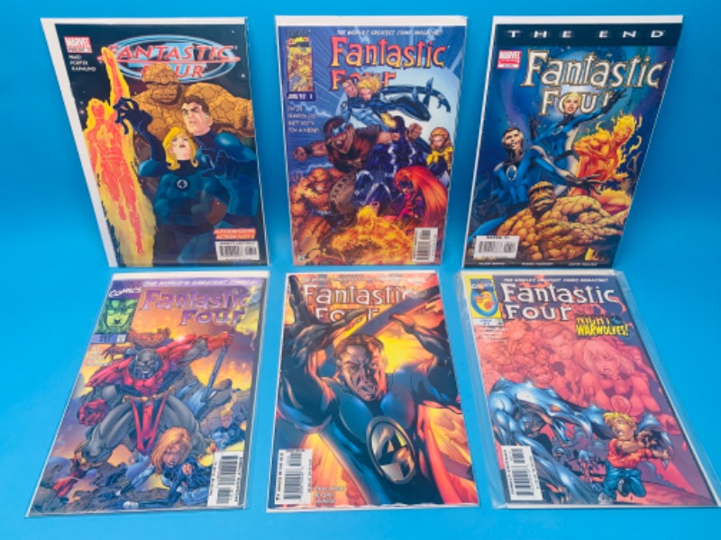 Photo 1 of 986472…6 fantastic four comics in plastic sleeves 