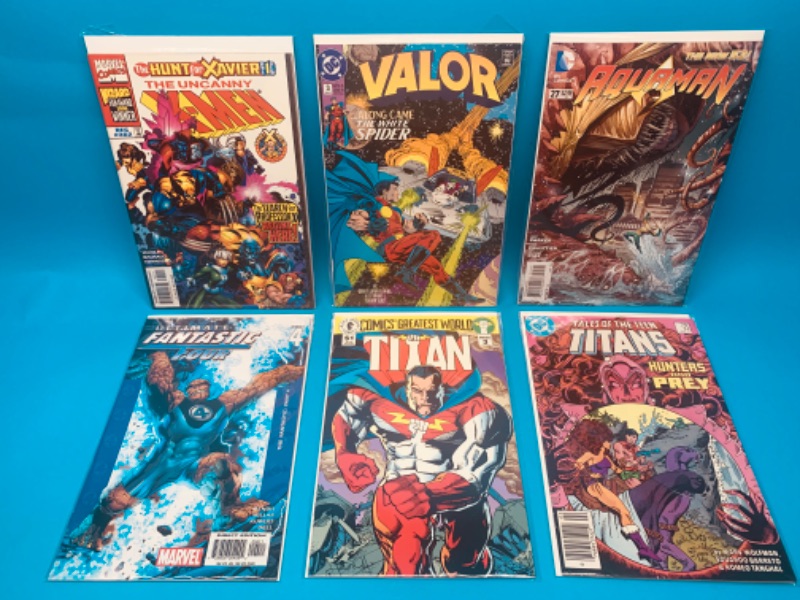 Photo 1 of 986476…  6 comics in plastic sleeves 