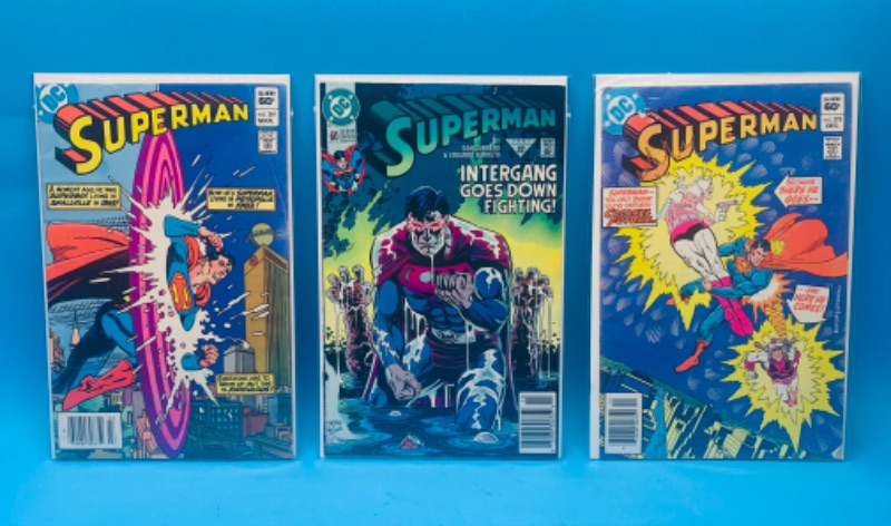 Photo 1 of 986478…3 vintage Superman  comics in plastic sleeves 