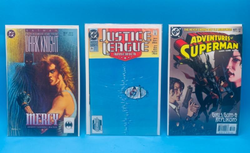 Photo 1 of 986493…3  comics in plastic sleeves 