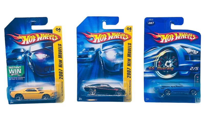 Photo 1 of 986515…3 hot wheels die cast mustangs 