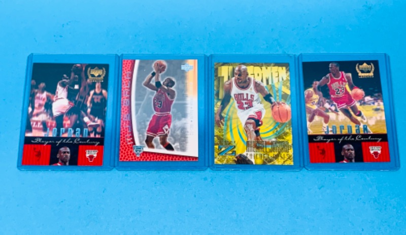 Photo 1 of 986731… 4 Michael Jordan trading cards in hard plastic sleeves 