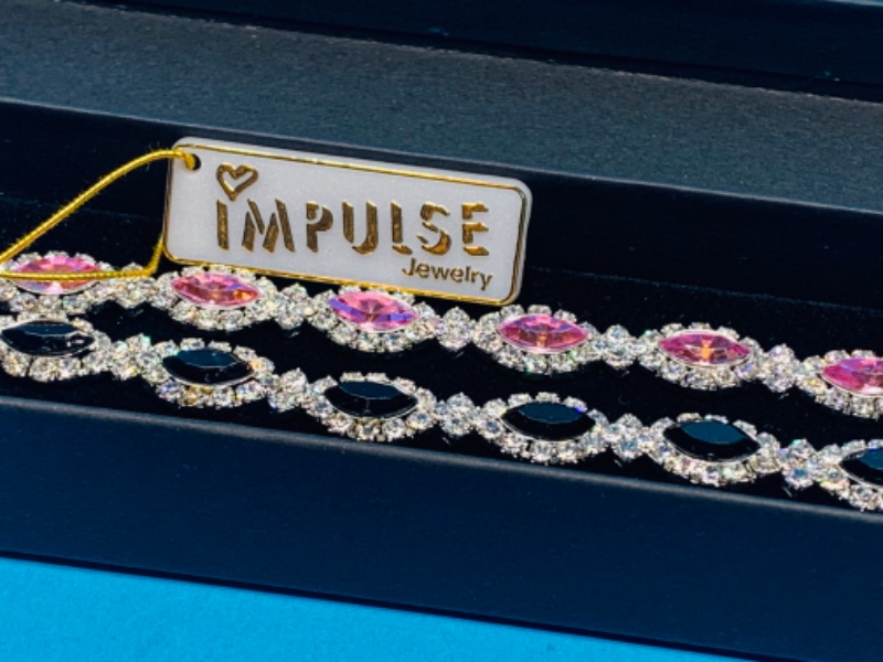 Photo 1 of 986736… 2 Impulse fashion bracelets in gift box