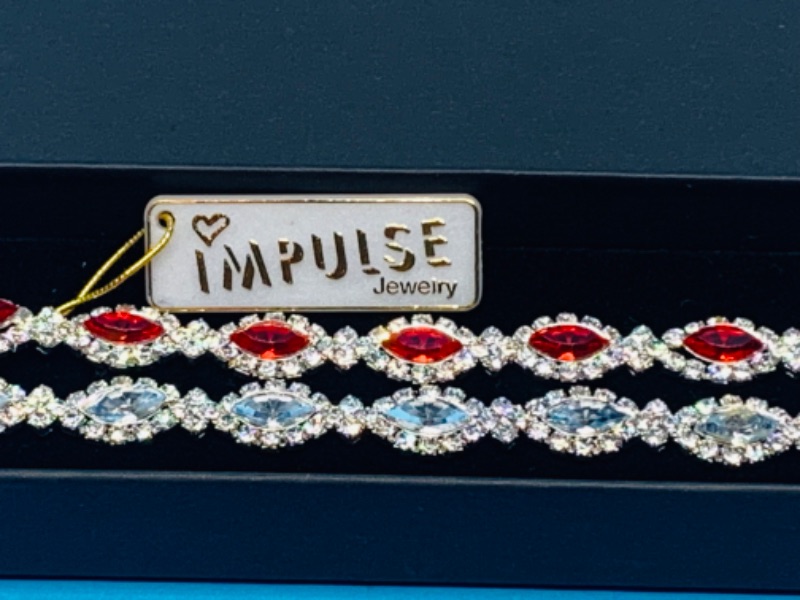 Photo 1 of 986738… 2 Impulse fashion bracelets in gift box