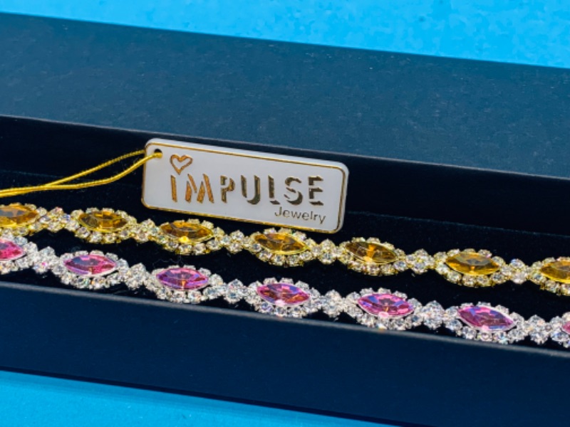 Photo 1 of 986740… 2 Impulse fashion bracelets in gift box