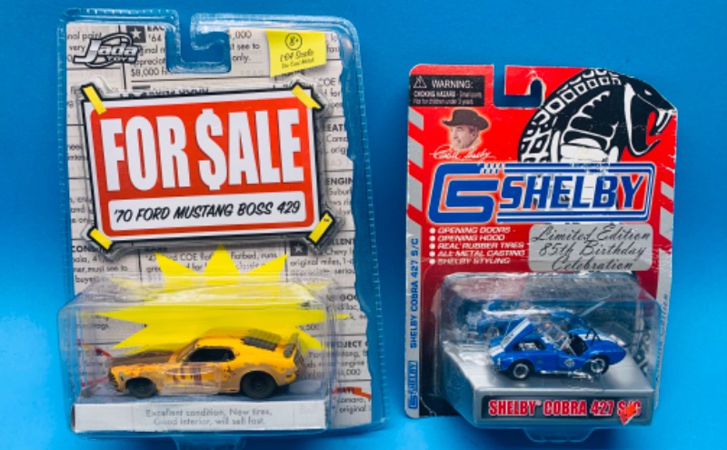 Photo 1 of 986774…2 die cast Ford Mustang cars