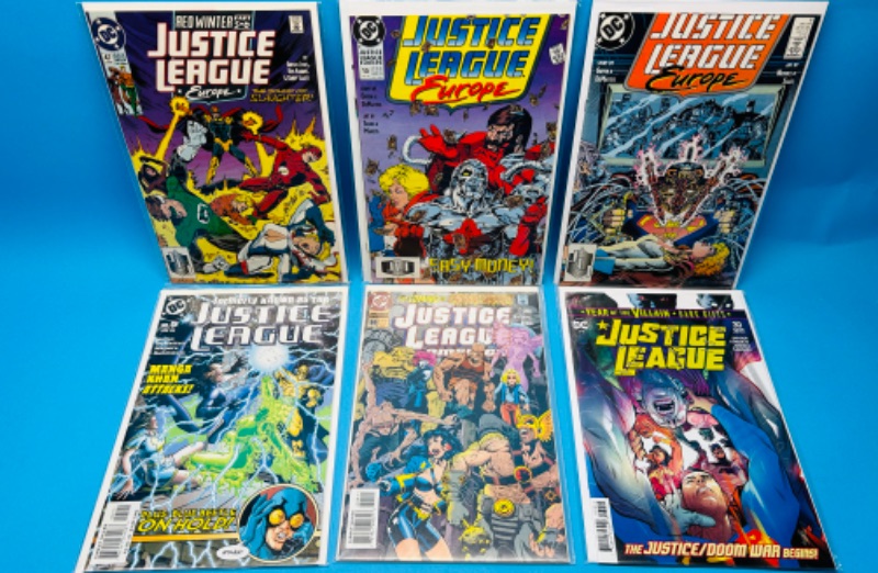 Photo 1 of 986943…6 older justice league  comics in plastic sleeves 