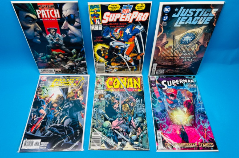 Photo 1 of 986944…6  comics in plastic sleeves 