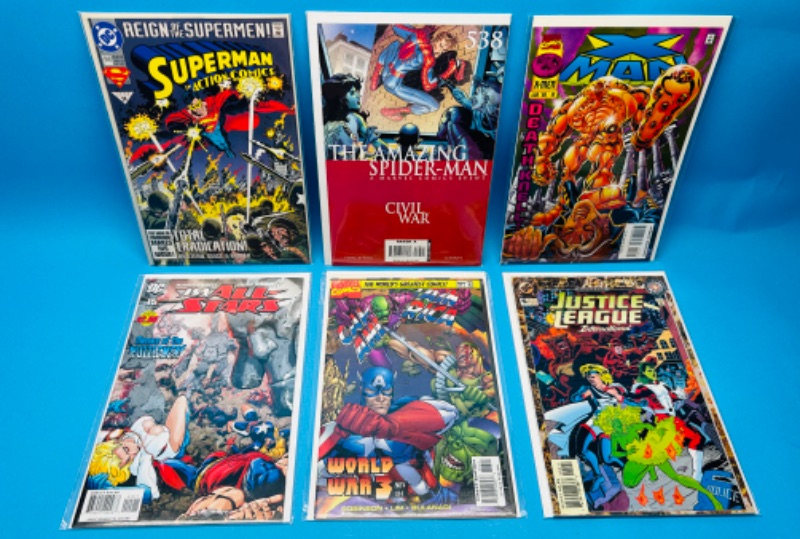 Photo 1 of 986945…6  comics in plastic sleeves 