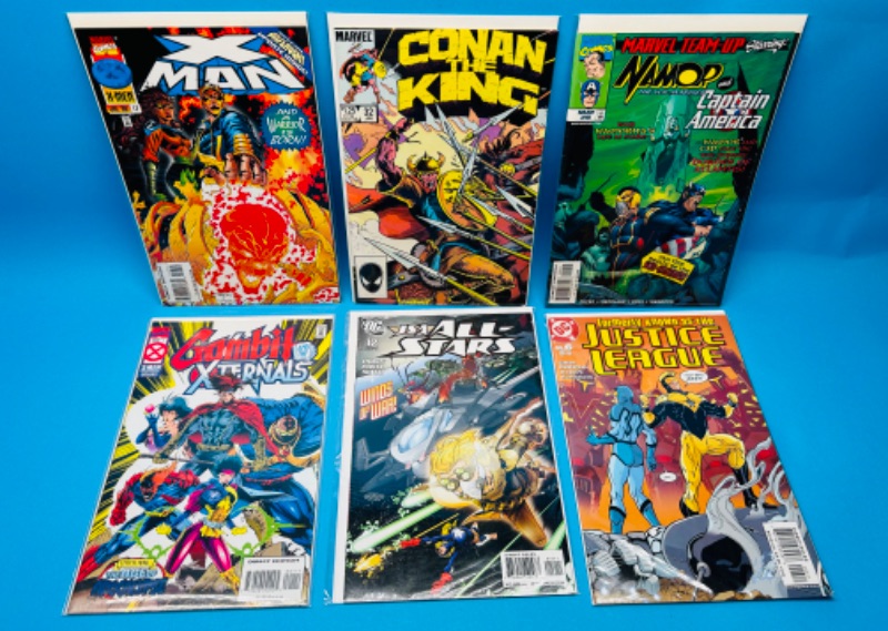 Photo 1 of 986954…6  comics in plastic sleeves 