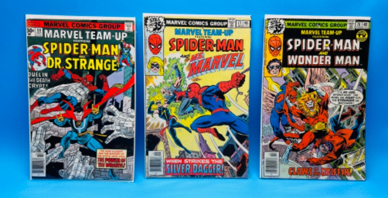 Photo 1 of 986956…3 vintage Spider-Man  comics in plastic sleeves 