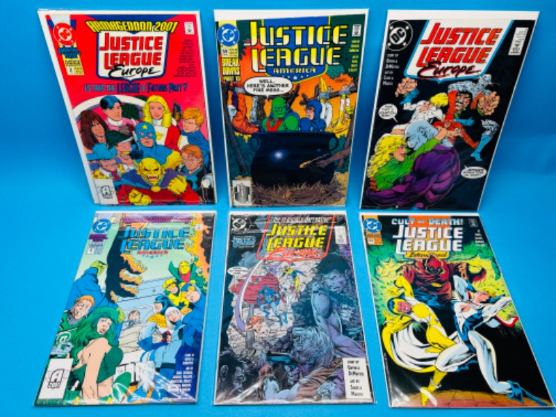 Photo 1 of 986957…6 older justice league  comics in plastic sleeves 