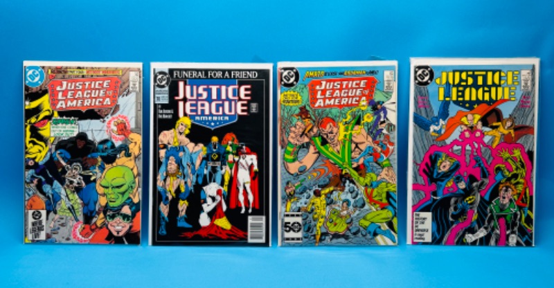 Photo 1 of 987248…4 vintage justice league comics in plastic sleeves 