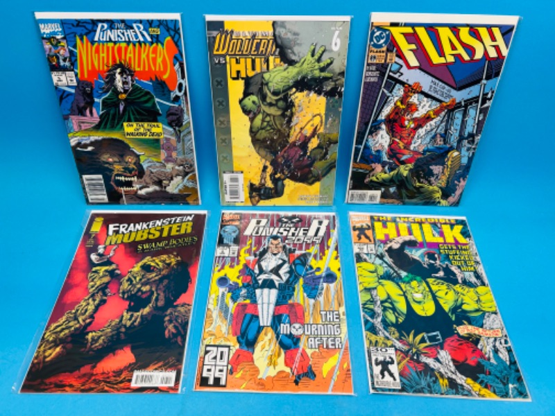 Photo 1 of 987376…6  comics in plastic sleeves 