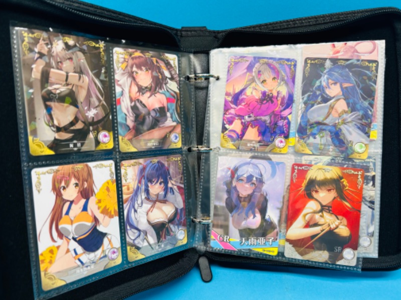 Photo 1 of 987385…60 Asian anime cards in binder-some holo