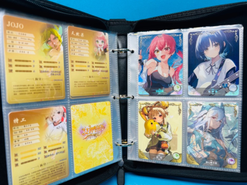 Photo 5 of 987385…60 Asian anime cards in binder-some holo