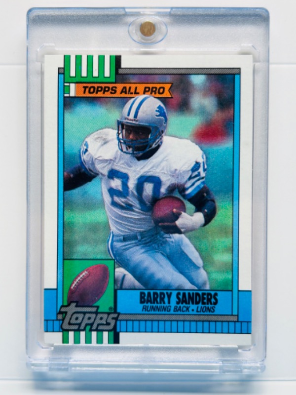 Photo 1 of 987391…Barry Sanders Rookie card  in hard plastic case