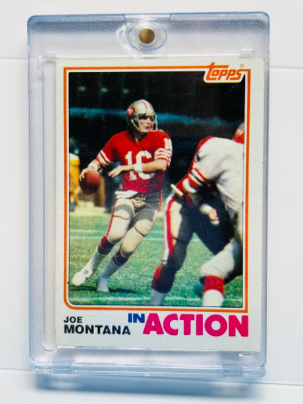 Photo 1 of 987392…topps Joe Montana in action card 489  in hard plastic case