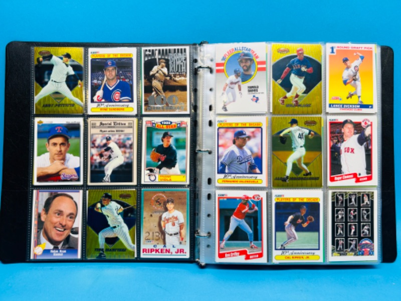 Photo 1 of 987431…324 mixed baseball trading cards in binder 