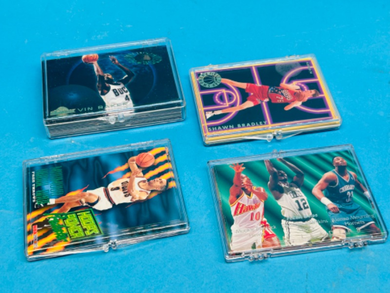 Photo 1 of 987444…4 basketball card sets in cases