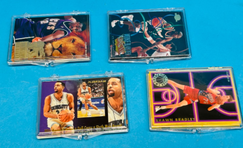 Photo 1 of 987446…4 basketball card sets in cases