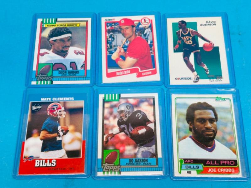 Photo 1 of 987448…6 sports rookie cards in hard plastic sleeves 