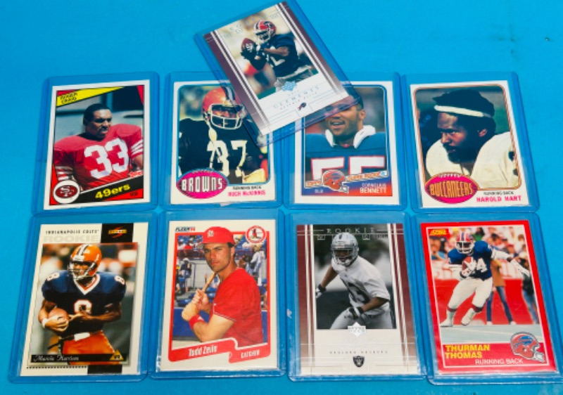 Photo 1 of 987450…sports rookie cards in hard plastic sleeves 