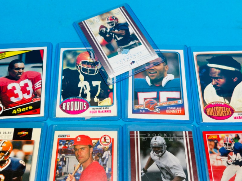 Photo 2 of 987450…sports rookie cards in hard plastic sleeves 