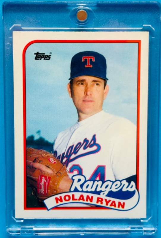 Photo 1 of 987456…topps Nolan Ryan card 107T in hard plastic case 