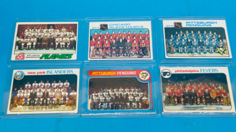 Photo 1 of 987470…6 vintage hockey team cards from the 1970’s in hard plastic sleeves 