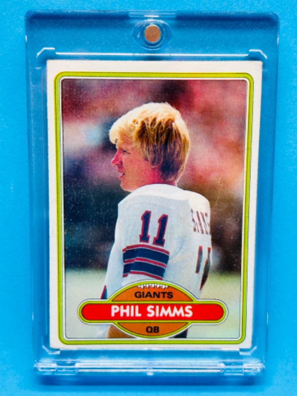 Photo 1 of 987476…Phil Simms Rookie card 225  in hard plastic case 