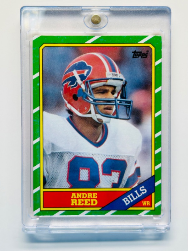 Photo 1 of 987480…Andre Reed Rookie card 388  in hard plastic case 