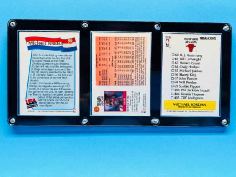 Photo 2 of 987499…3 Michael Jordan cards in display case