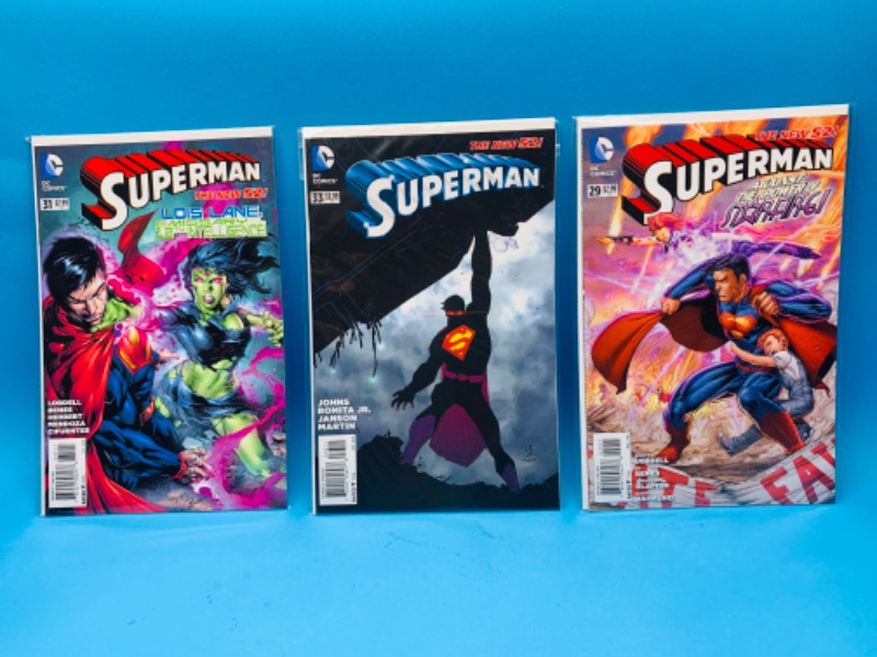 Photo 1 of 987530…3 Superman comics in plastic sleeves 