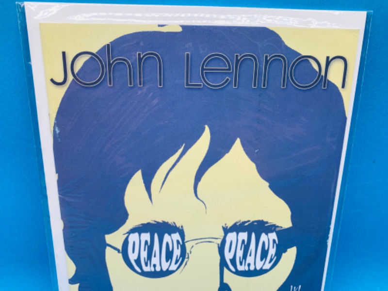 Photo 2 of 987551…John Lennon peace comic in plastic sleeve 