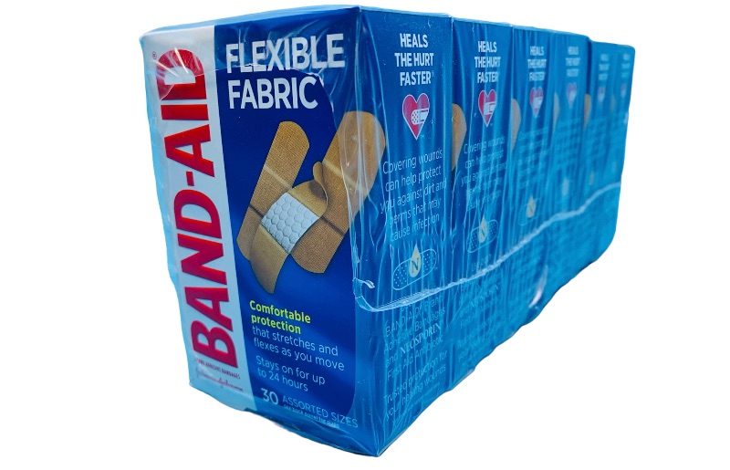 Photo 1 of 987657… 6 boxes o flexible fabric bandaids 30 per box assorted sizes 