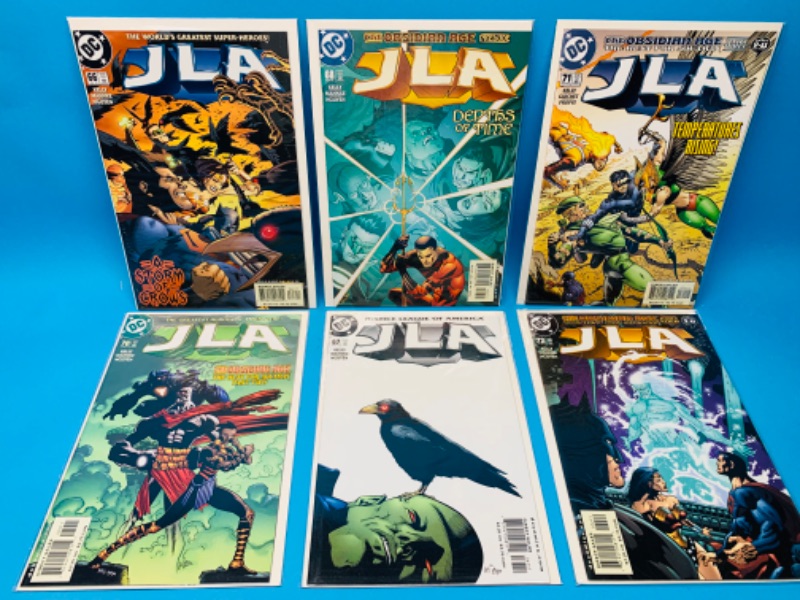 Photo 1 of 987833…6 JLA  comics in plastic sleeves 