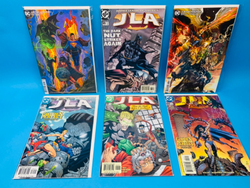 Photo 1 of 987834…6 JLA   comics in plastic sleeves 