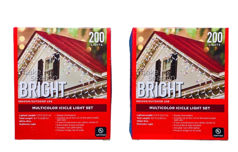 Photo 1 of 988109… 2 boxes of multicolored icicle light sets 