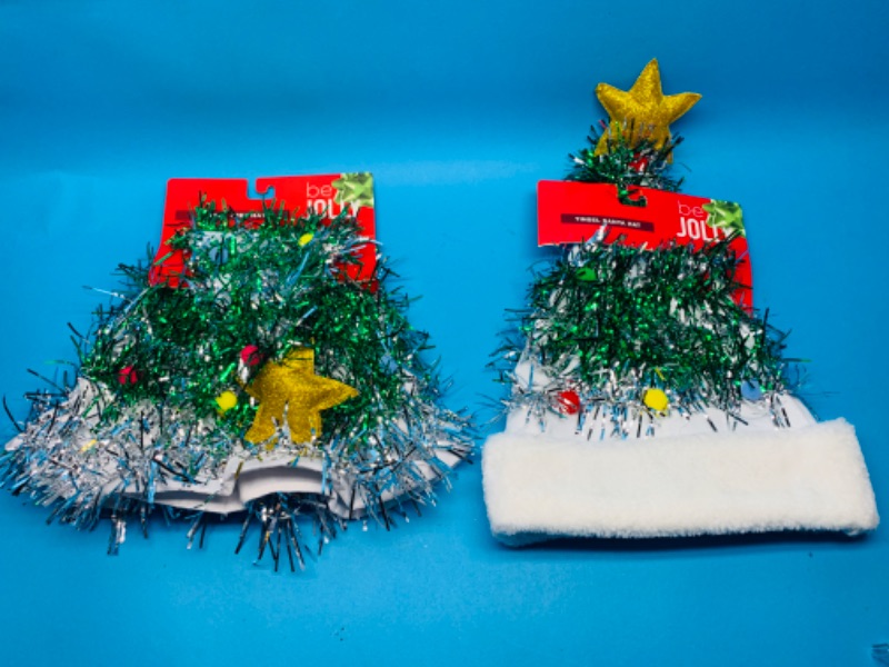 Photo 1 of 988229…2 tinsel Santa hats
